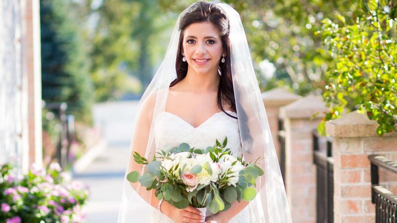 Bride with flowers outdoors