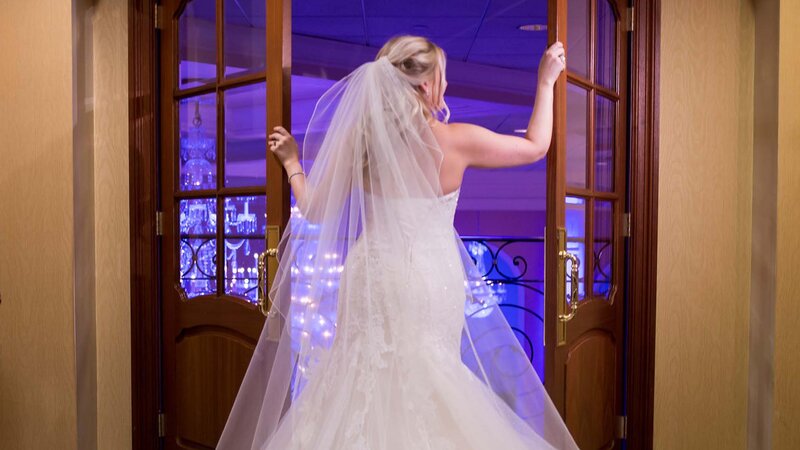 Bride standing at door