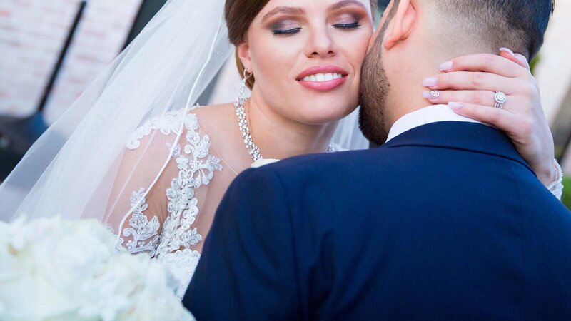 Bride & Groom embracing