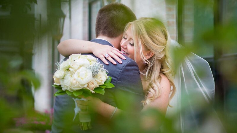 Bride & Groom hugging.